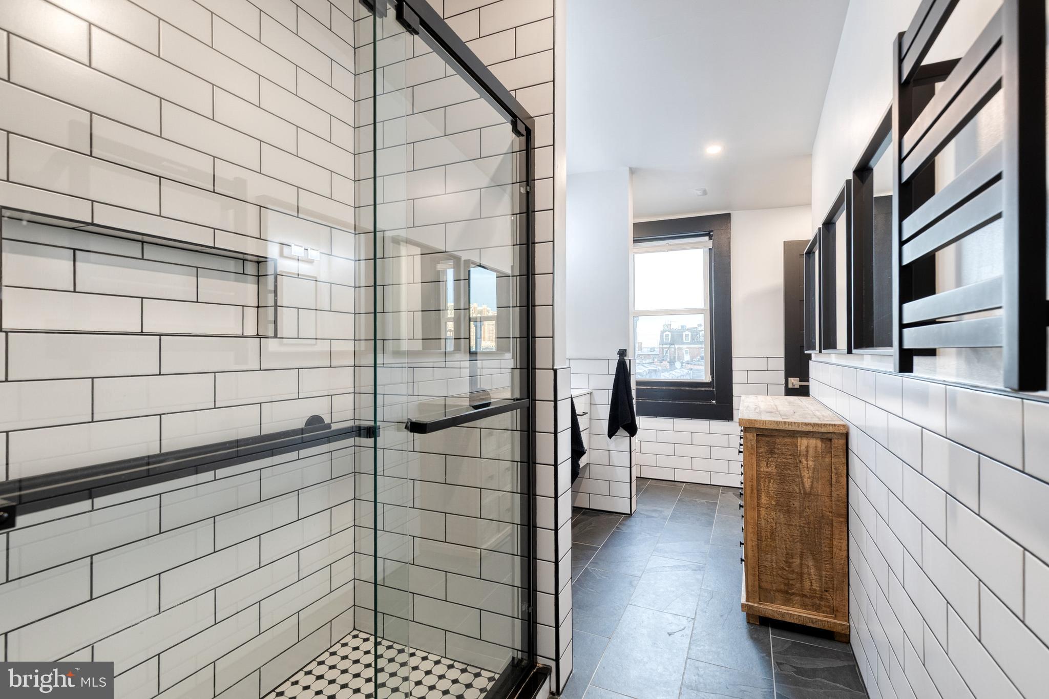 862 Tyson Street Baltimore, MD 21201 - Photo 46 of 62 a bathroom with a shower and a sink