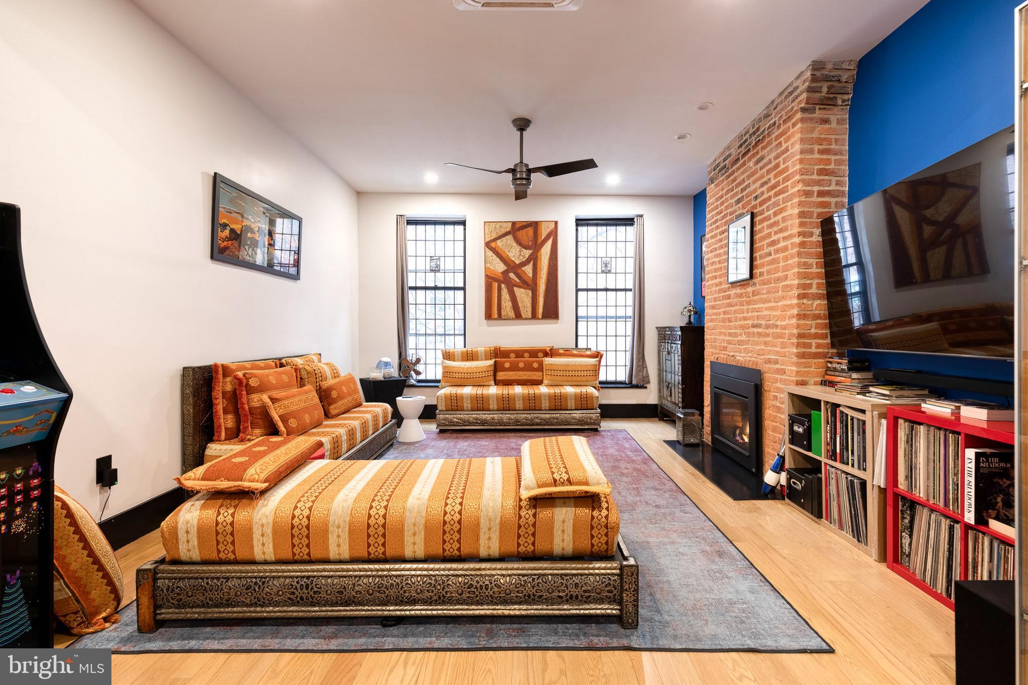 862 Tyson Street Baltimore, MD 21201 - Photo 5 of 62 a living room with furniture and a flat screen tv