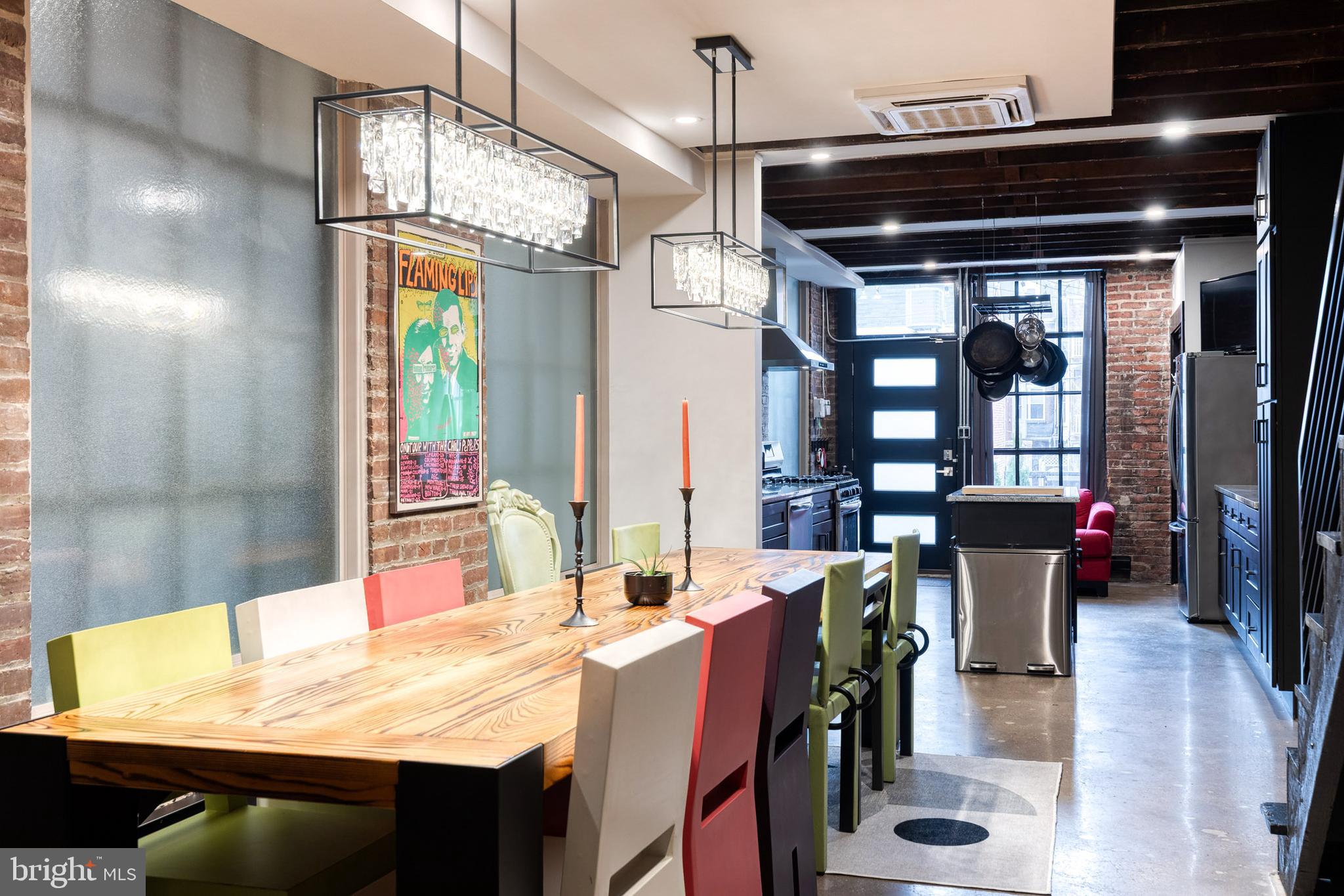 862 Tyson Street Baltimore, MD 21201 - Photo 6 of 62 a view of a dining room with furniture and a chandelier