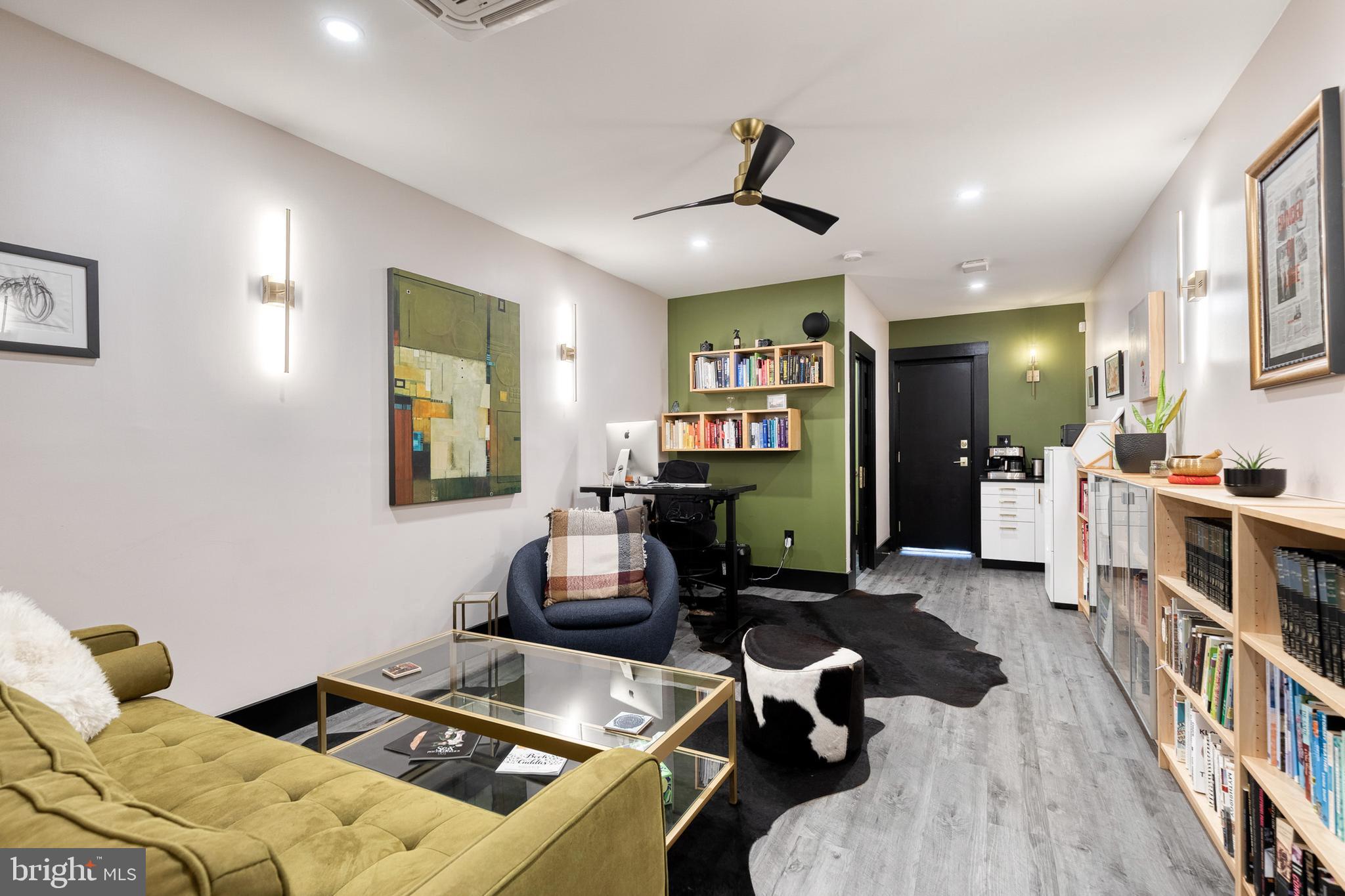 862 Tyson Street Baltimore, MD 21201 - Photo 9 of 62 a living room with furniture and a wooden floor