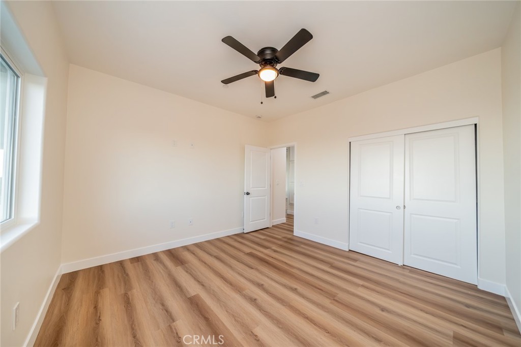 1114 Hollister Road Pinon Hills, CA 92372 - Photo 16 of 61 a view of cabinets and wooden floor