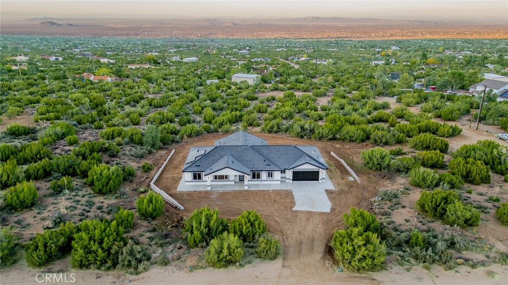 1114 Hollister Road Pinon Hills, CA 92372 - Photo 53 of 61 an aerial view of a house with a garden