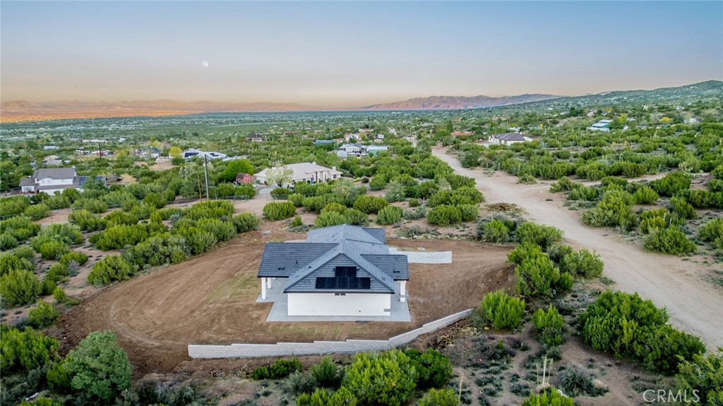 1114 Hollister Road Pinon Hills, CA 92372 - Photo 58 of 61 an aerial view of a house with a garden