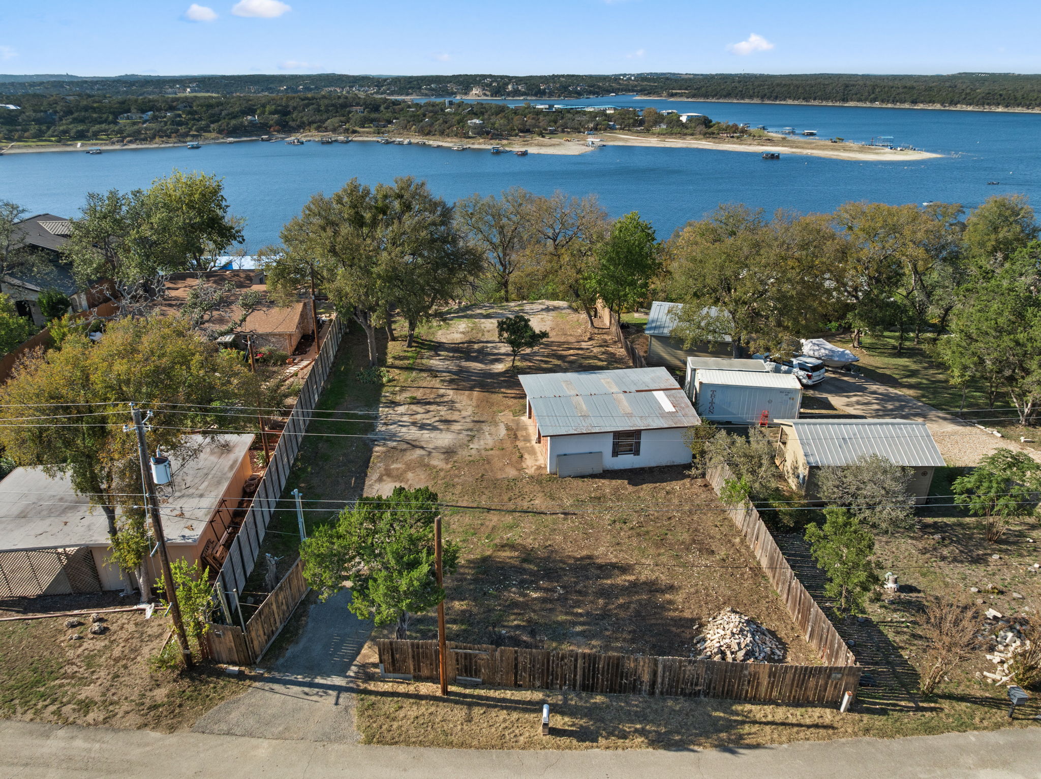 16453 Lake Loop Austin, TX 78734 - Photo 12 of 24 a view of a lake with houses
