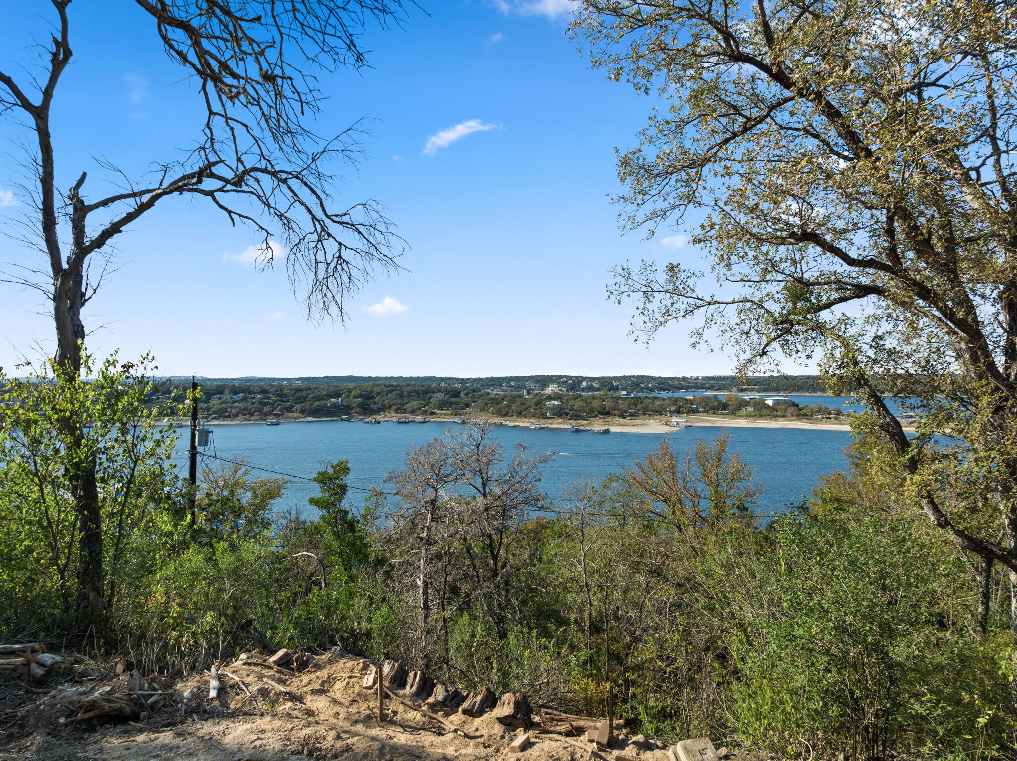 16453 Lake Loop Austin, TX 78734 - Photo 14 of 24 a view of a lake from a yard
