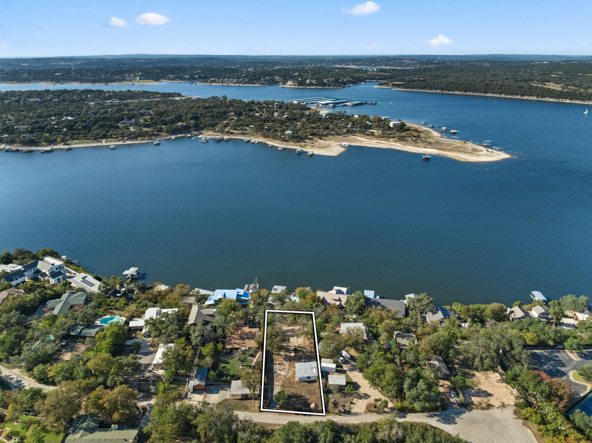 16453 Lake Loop Austin, TX 78734 - Photo 4 of 24 an aerial view of a houses with ocean view