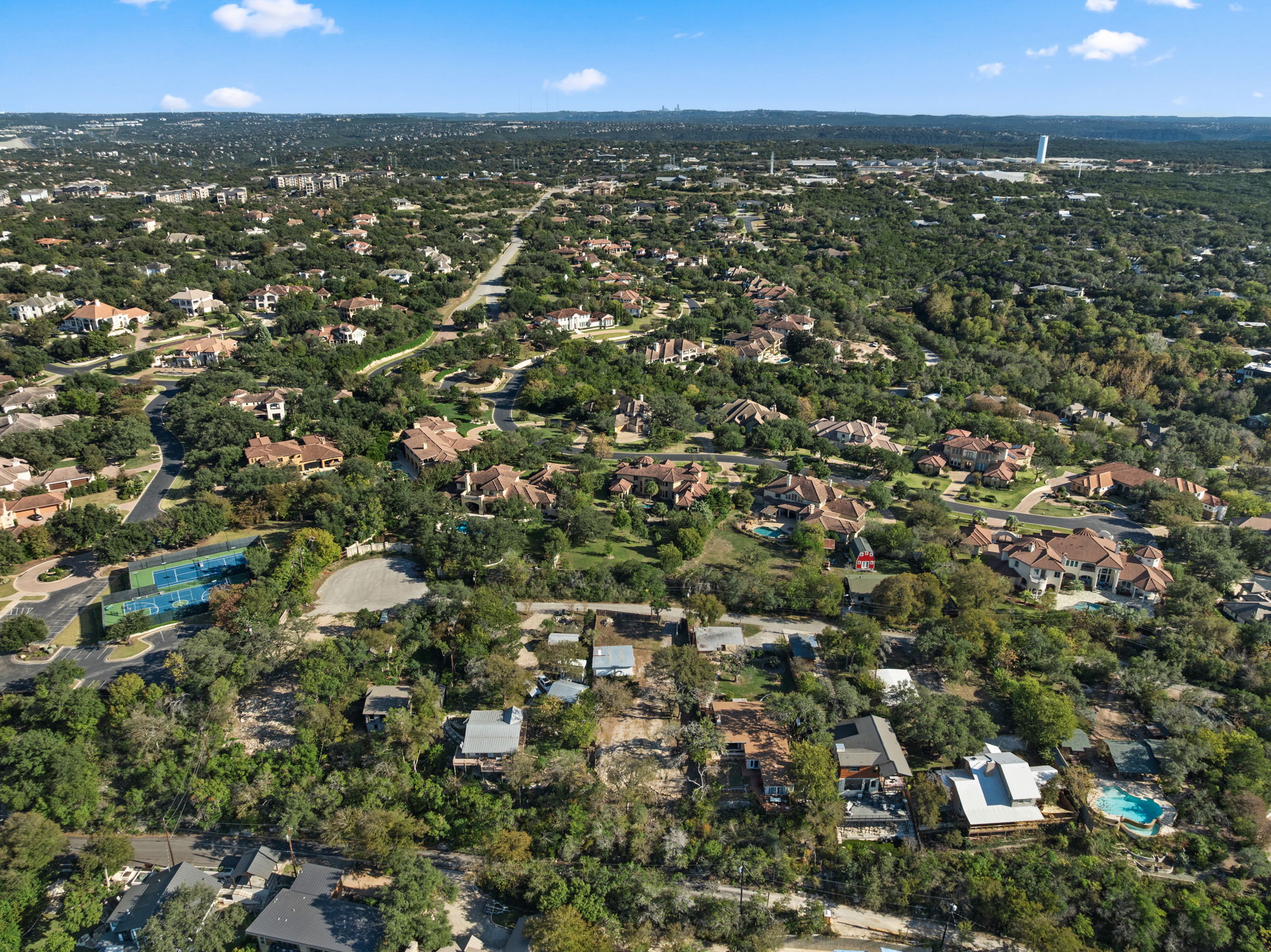 16453 Lake Loop Austin, TX 78734 - Photo 9 of 24 an aerial view of residential houses with city view