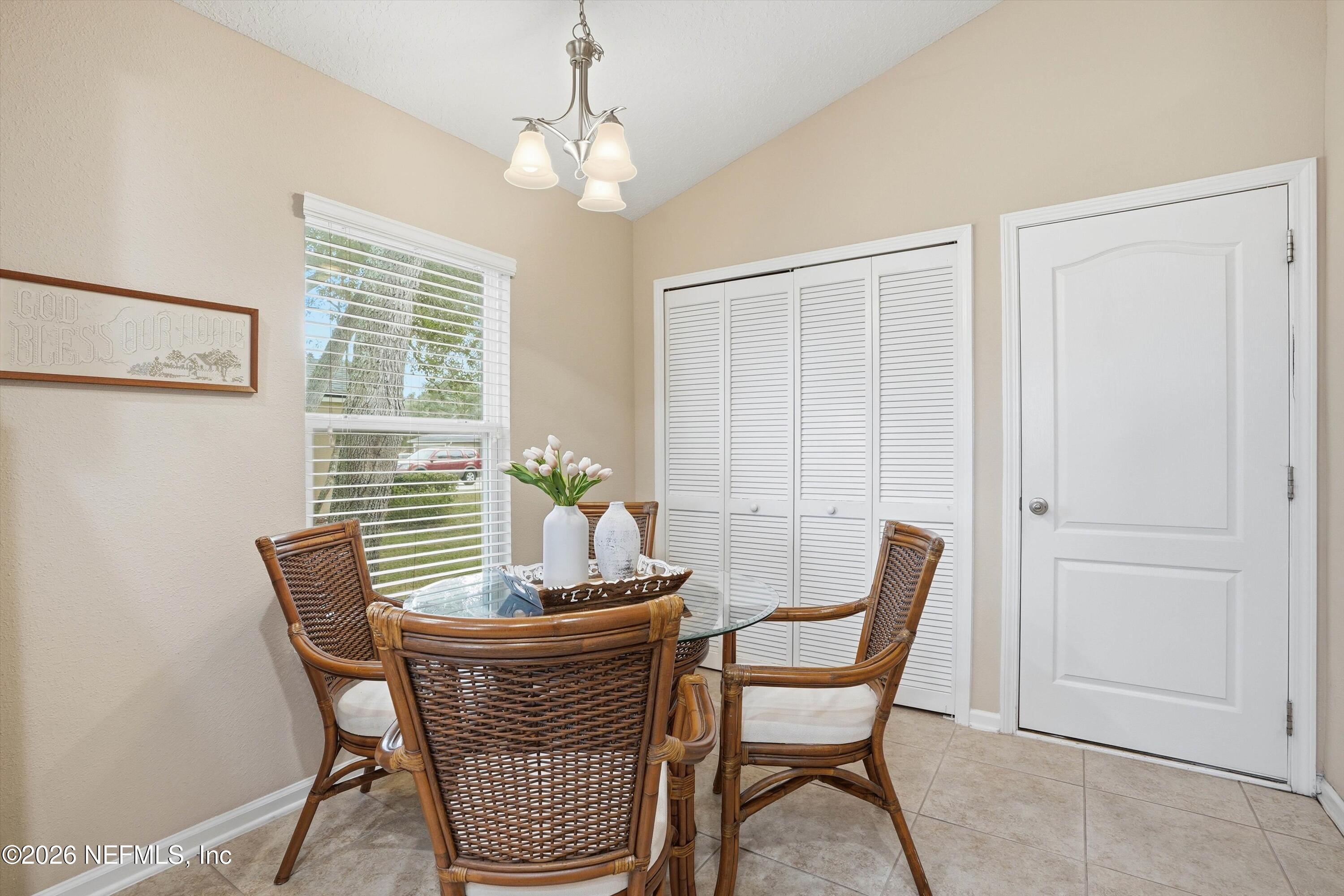 1833 Indigo Street Fernandina Beach, FL 32034 - Photo 14 of 41 a dining room with furniture and window