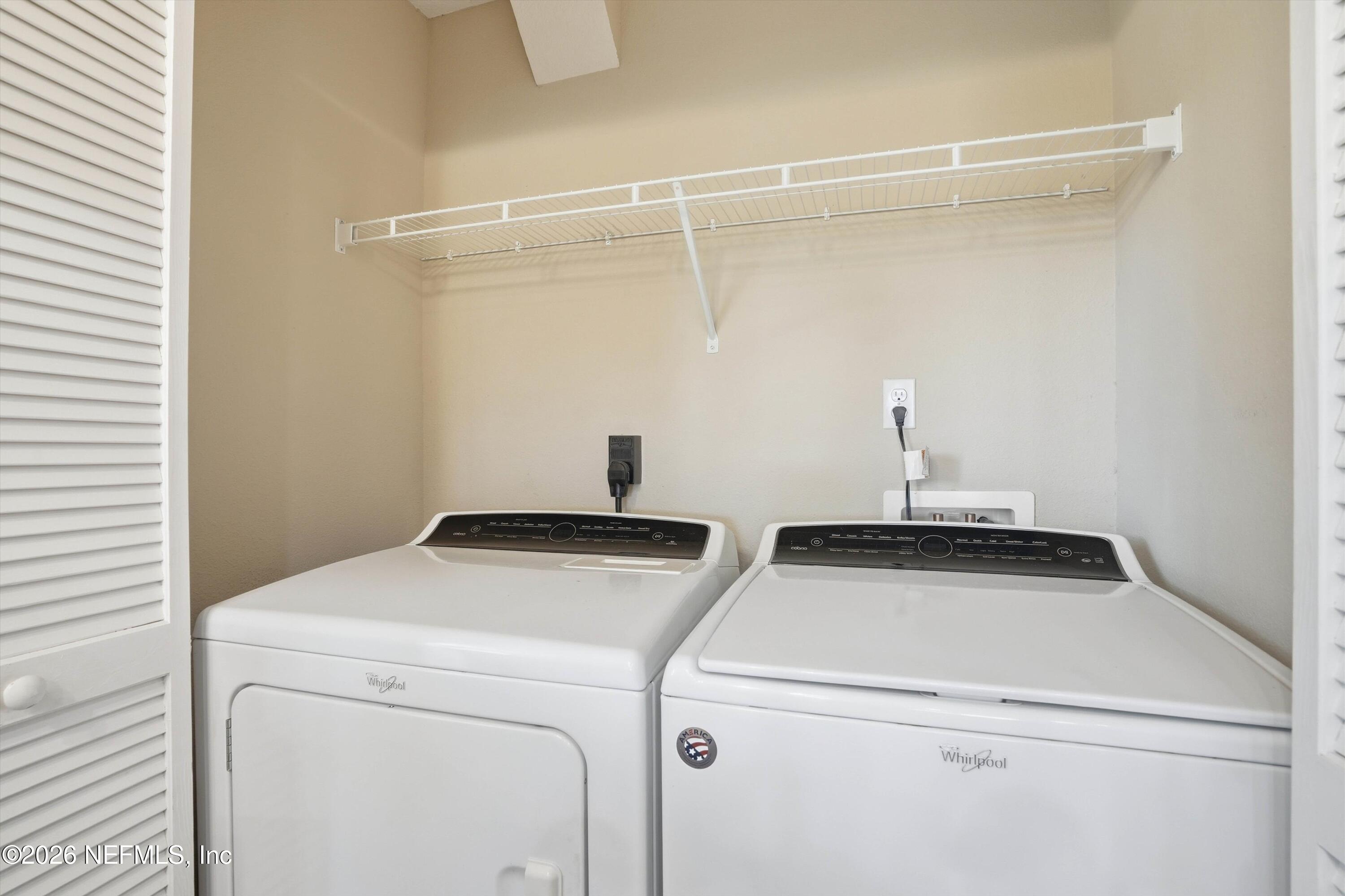 1833 Indigo Street Fernandina Beach, FL 32034 - Photo 15 of 41 a utility room with dryer and washer