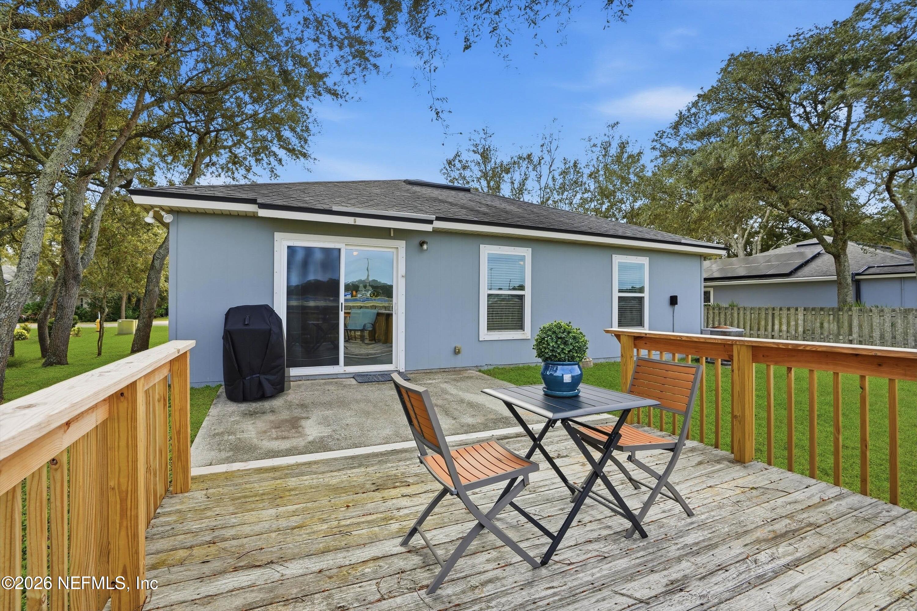 1833 Indigo Street Fernandina Beach, FL 32034 - Photo 28 of 41 a view of a house with backyard and sitting area
