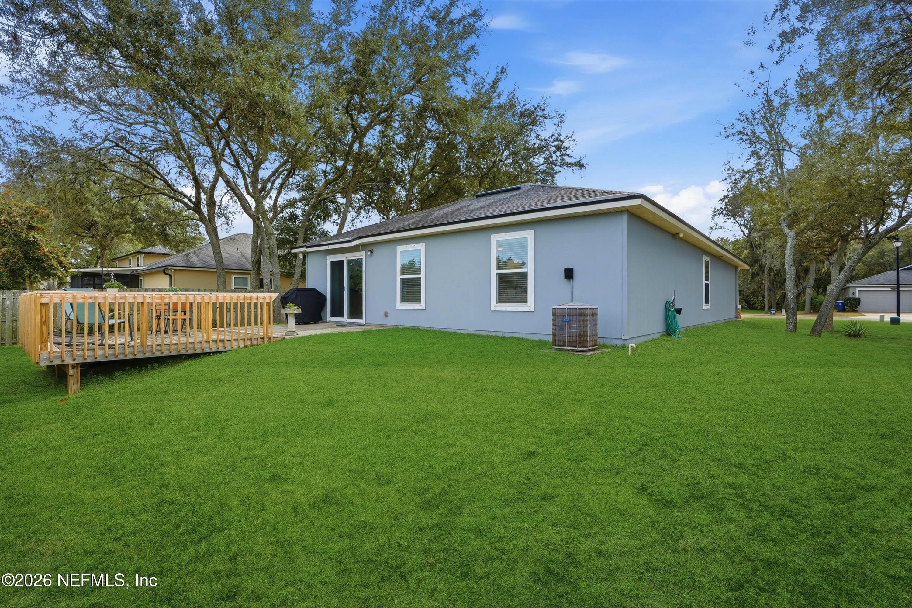 1833 Indigo Street Fernandina Beach, FL 32034 - Photo 30 of 41 a view of a house with a yard