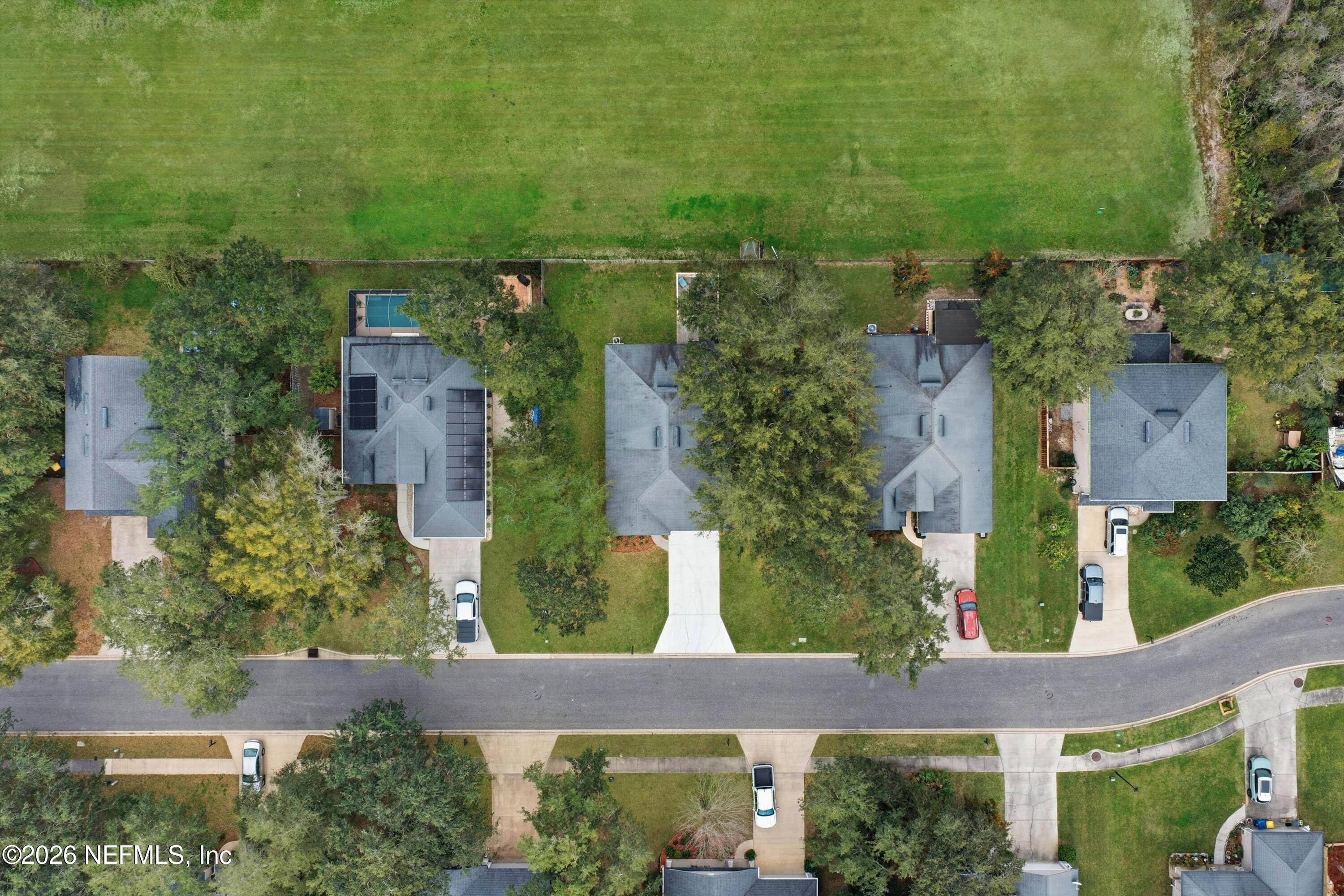 1833 Indigo Street Fernandina Beach, FL 32034 - Photo 35 of 41 an aerial view of a house with a yard basket ball court and outdoor seating