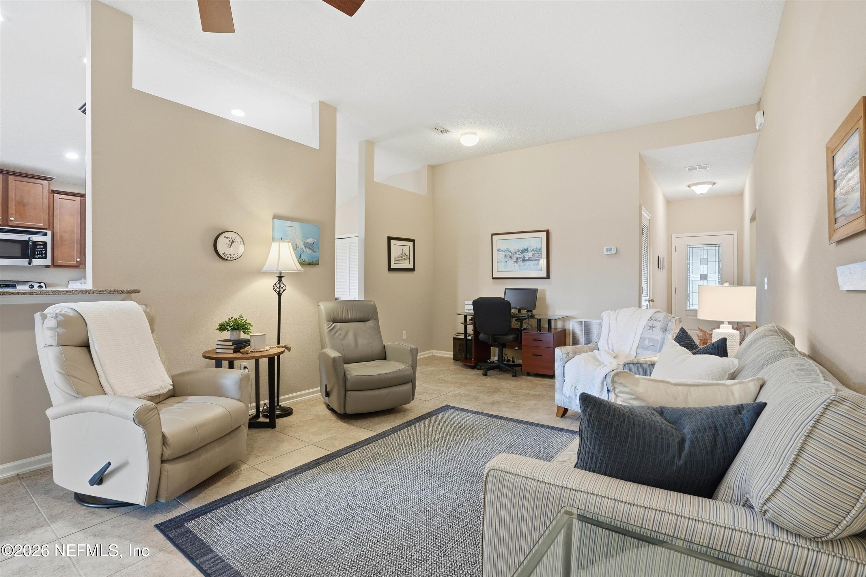 1833 Indigo Street Fernandina Beach, FL 32034 - Photo 7 of 41 a living room with furniture and a wooden floor