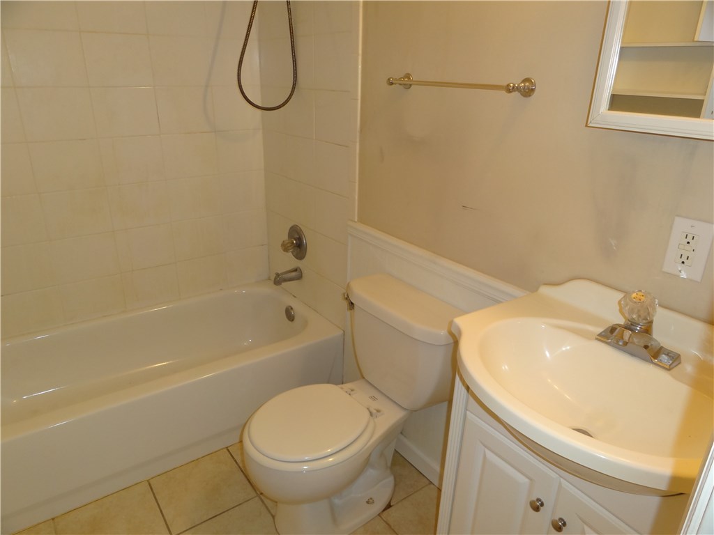 96681 Chester Road Yulee, FL 32097 - Photo 8 of 13 a bathroom with a toilet sink and shower