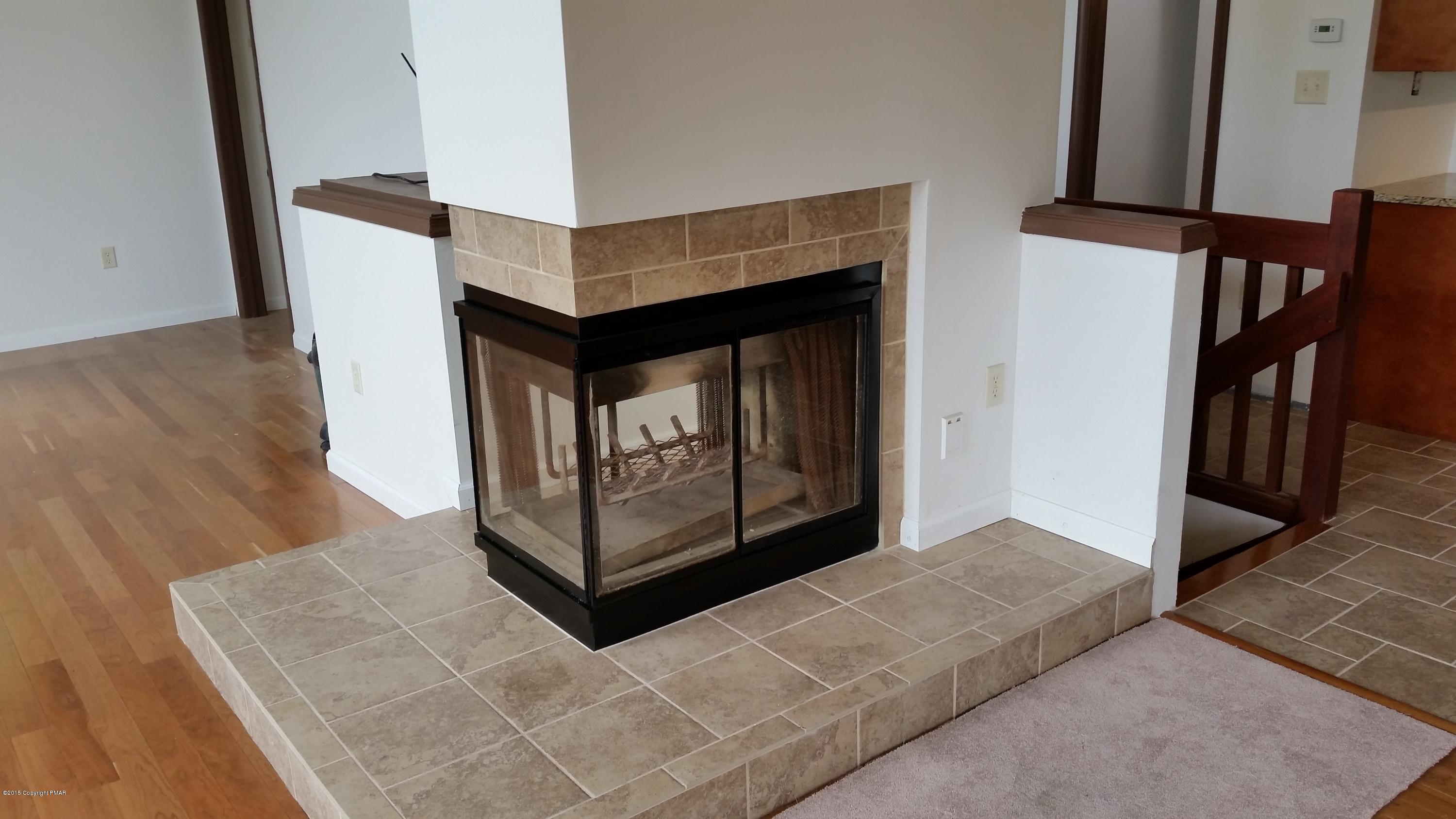 57 Spokane Road Albrightsville, PA 18210 - Photo 7 of 31 Living room fireplace