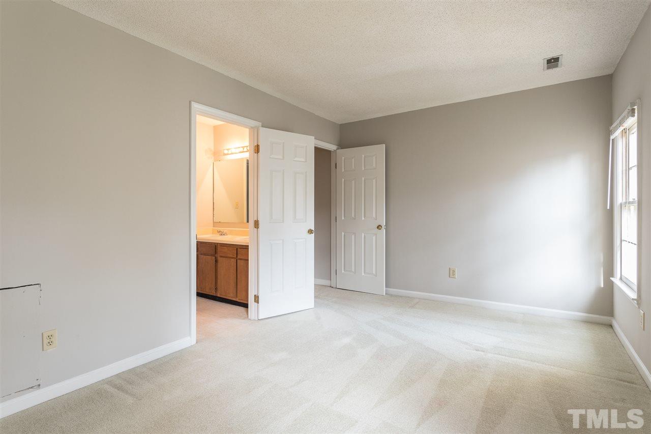 5630 Bridgetowne Way Raleigh, NC 27609 - Photo 22 of 26 a view of an empty room and a window