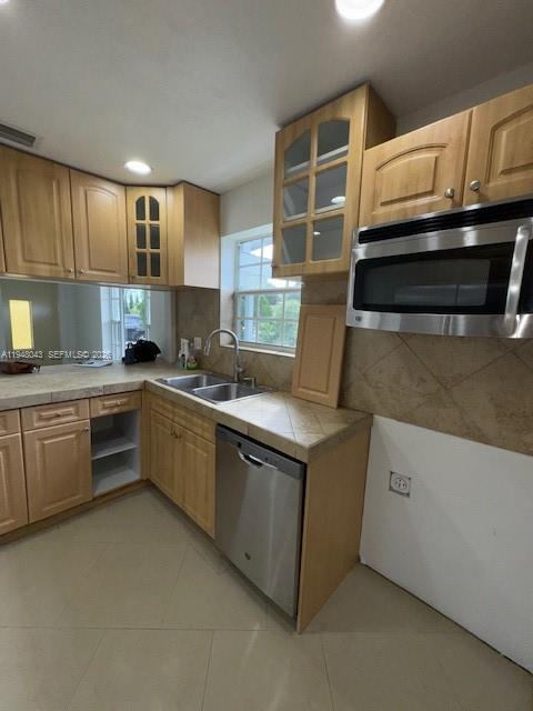 7625 Shalimar Street Miramar, FL 33023 - Photo 14 of 38 a kitchen with cabinets and appliances