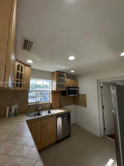 7625 Shalimar Street Miramar, FL 33023 - Photo 15 of 38 a large kitchen with stainless steel appliances kitchen island granite countertop a sink and cabinets
