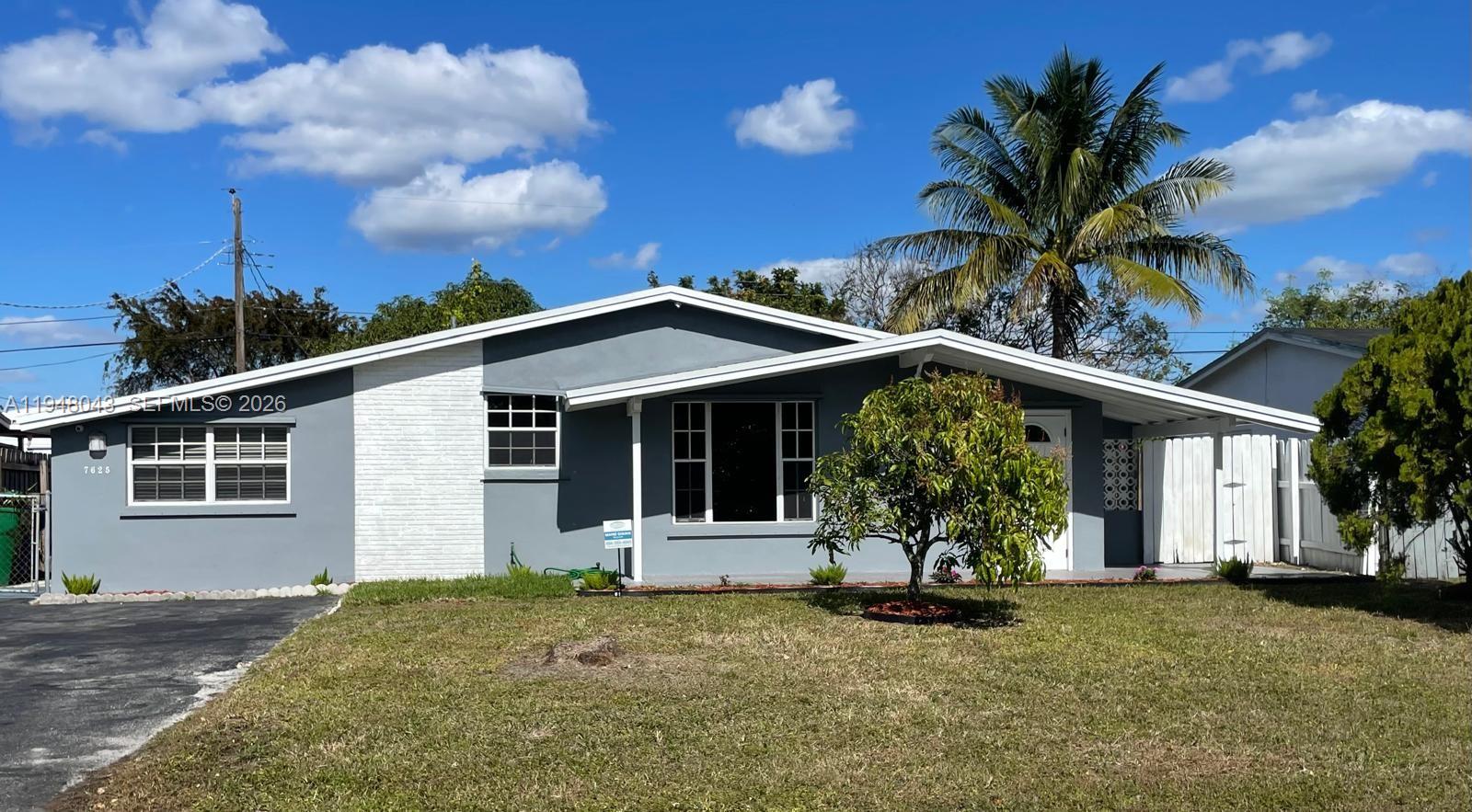 7625 Shalimar Street Miramar, FL 33023 - Photo 2 of 38 a house view with a garden space