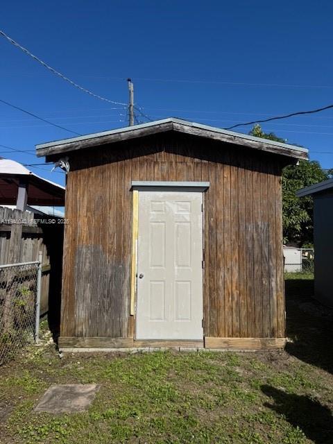 7625 Shalimar Street Miramar, FL 33023 - Photo 28 of 38 a front view of a house with a yard