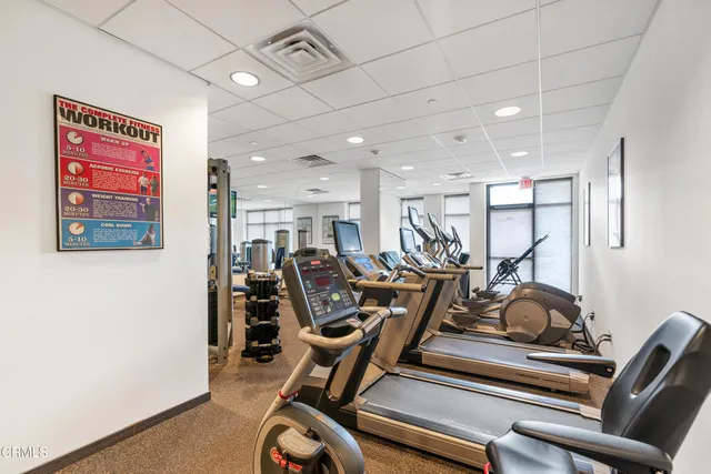 a view of a swimming pool with a lounge chairs