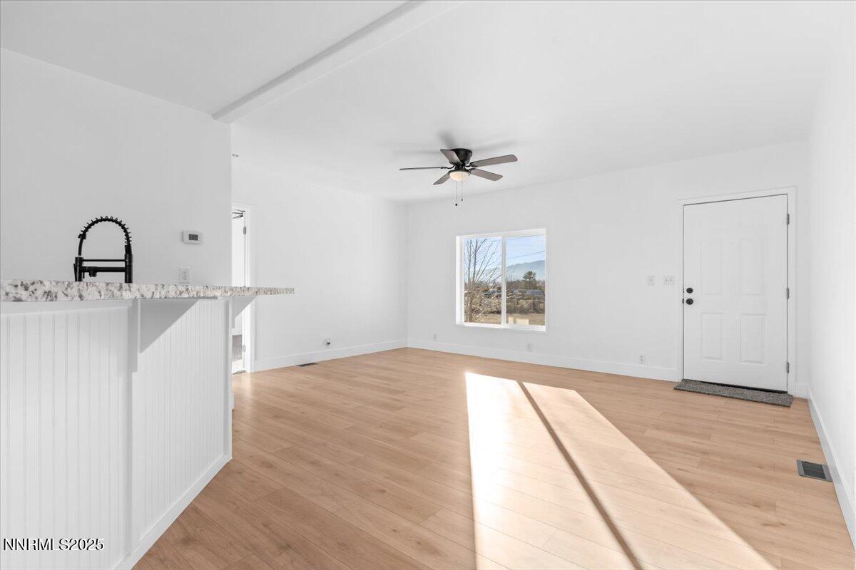 11305 Fir Drive Reno, NV 89506 - Photo 11 of 35 a view of an empty room with a window