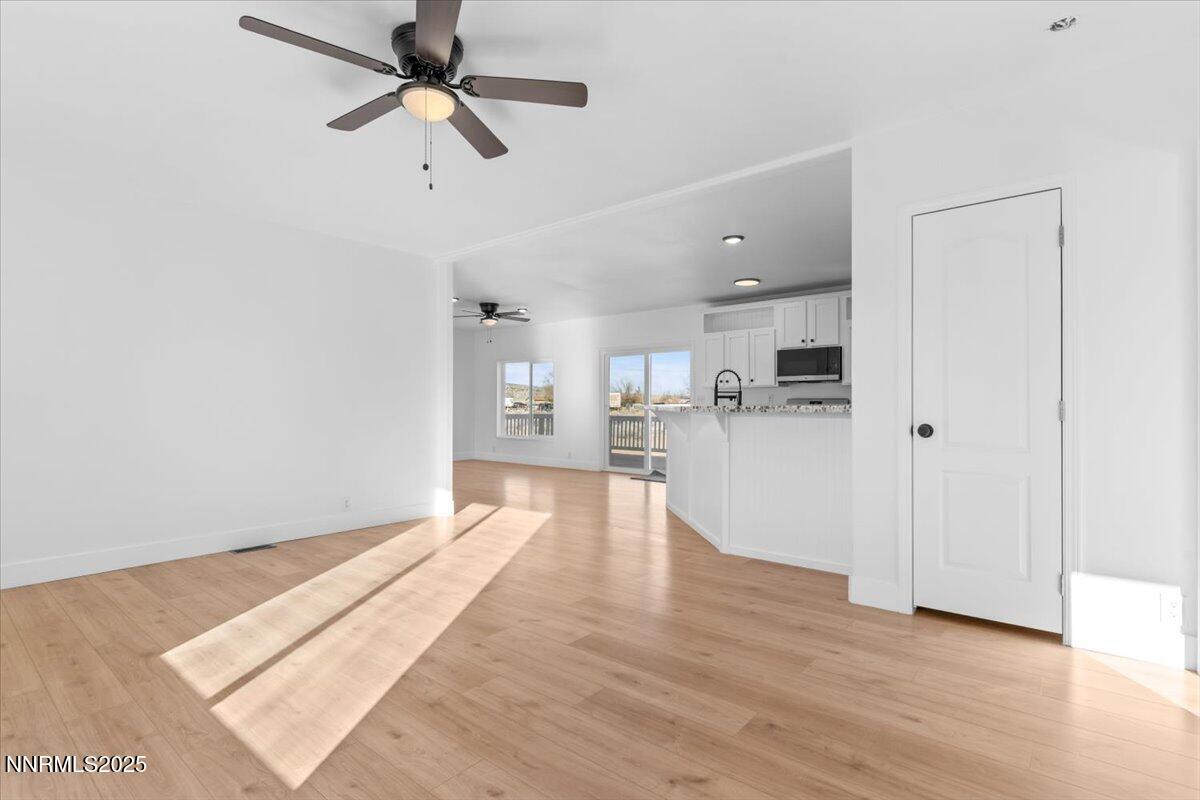11305 Fir Drive Reno, NV 89506 - Photo 12 of 35 a view of a kitchen with wooden floor