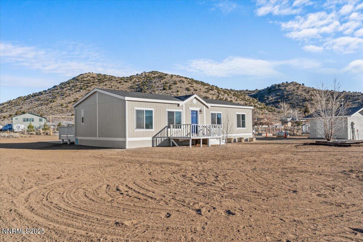 11305 Fir Drive Reno, NV 89506 - Photo 2 of 35 a view of a house with a snow in the background
