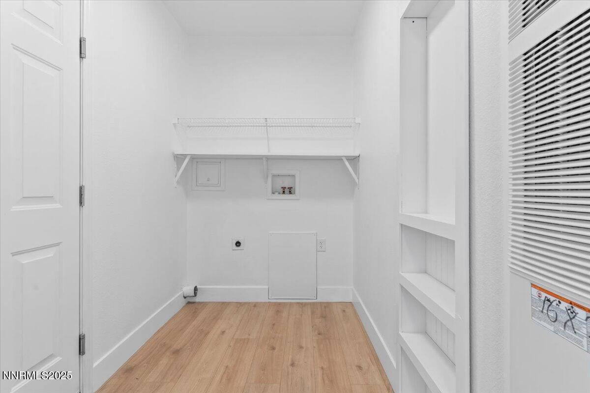 11305 Fir Drive Reno, NV 89506 - Photo 23 of 35 a view of storage and utility room with wooden floor