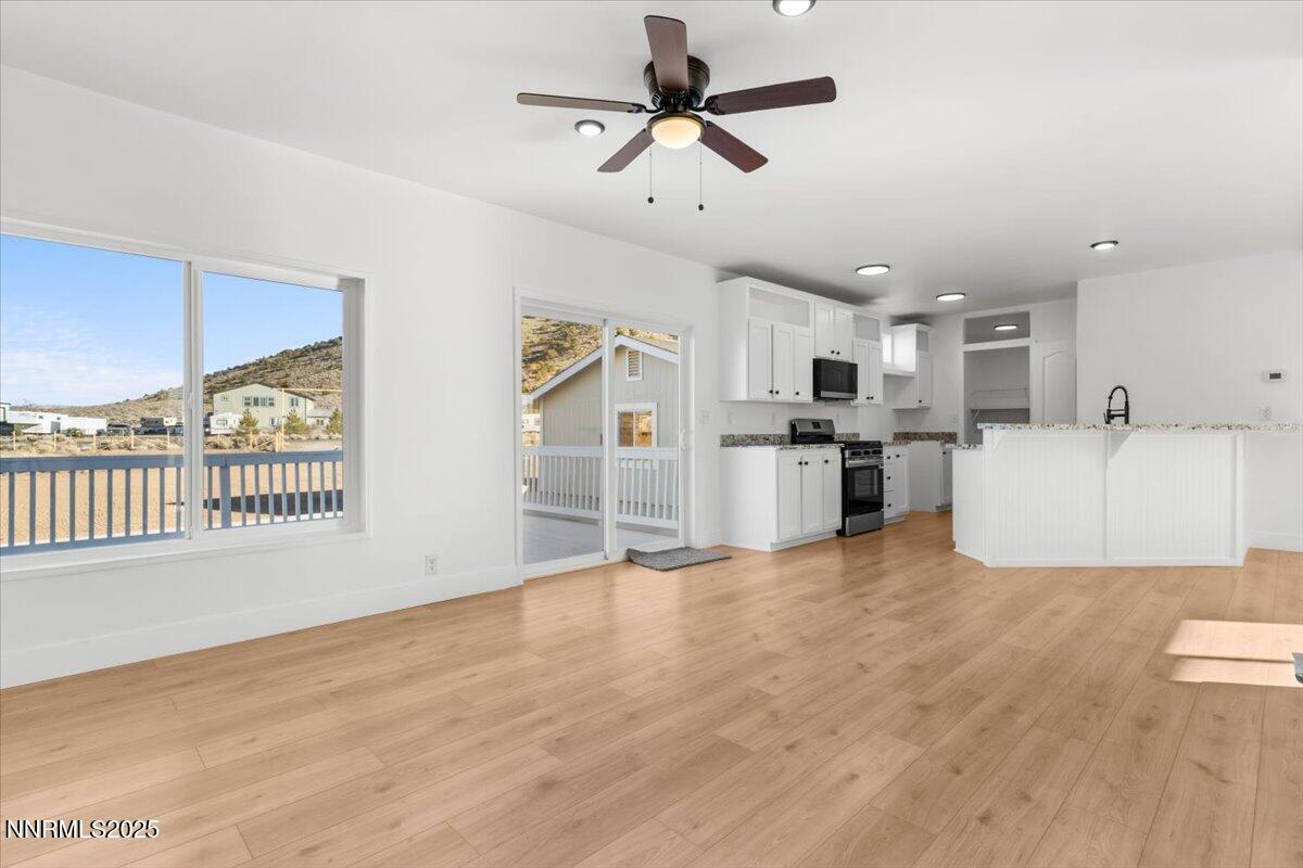 11305 Fir Drive Reno, NV 89506 - Photo 10 of 35 a view of a kitchen with a sink and a window