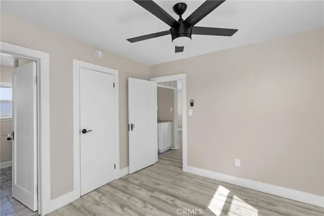 a view of a balcony with wooden floor