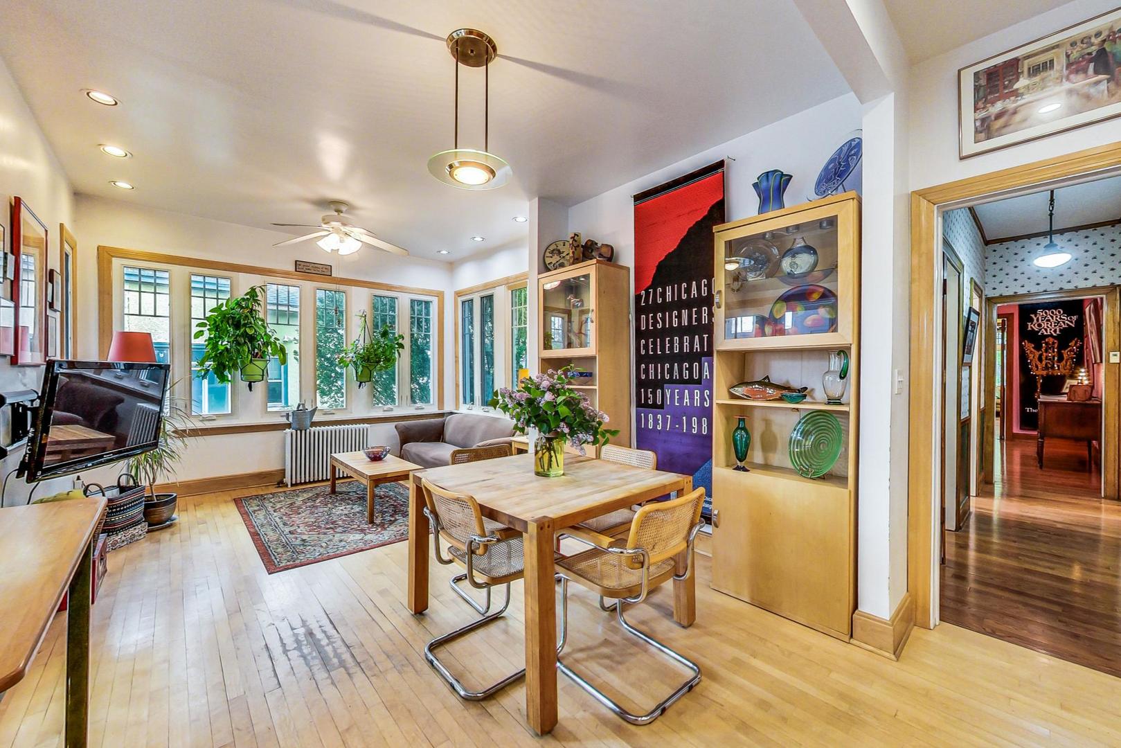 7221 North Ridge Boulevard Chicago, IL 60645 - Photo 15 of 48 a view of a dining room with furniture window and outside view