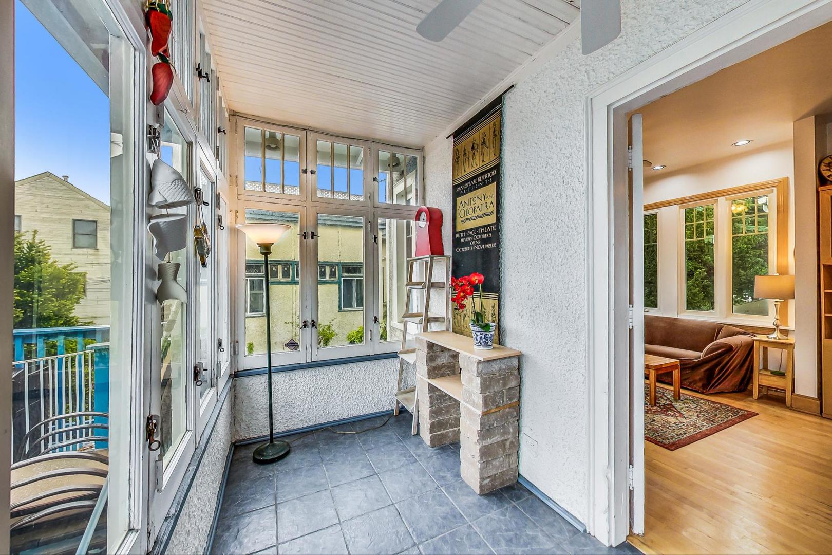 7221 North Ridge Boulevard Chicago, IL 60645 - Photo 19 of 48 a view of front door and porch