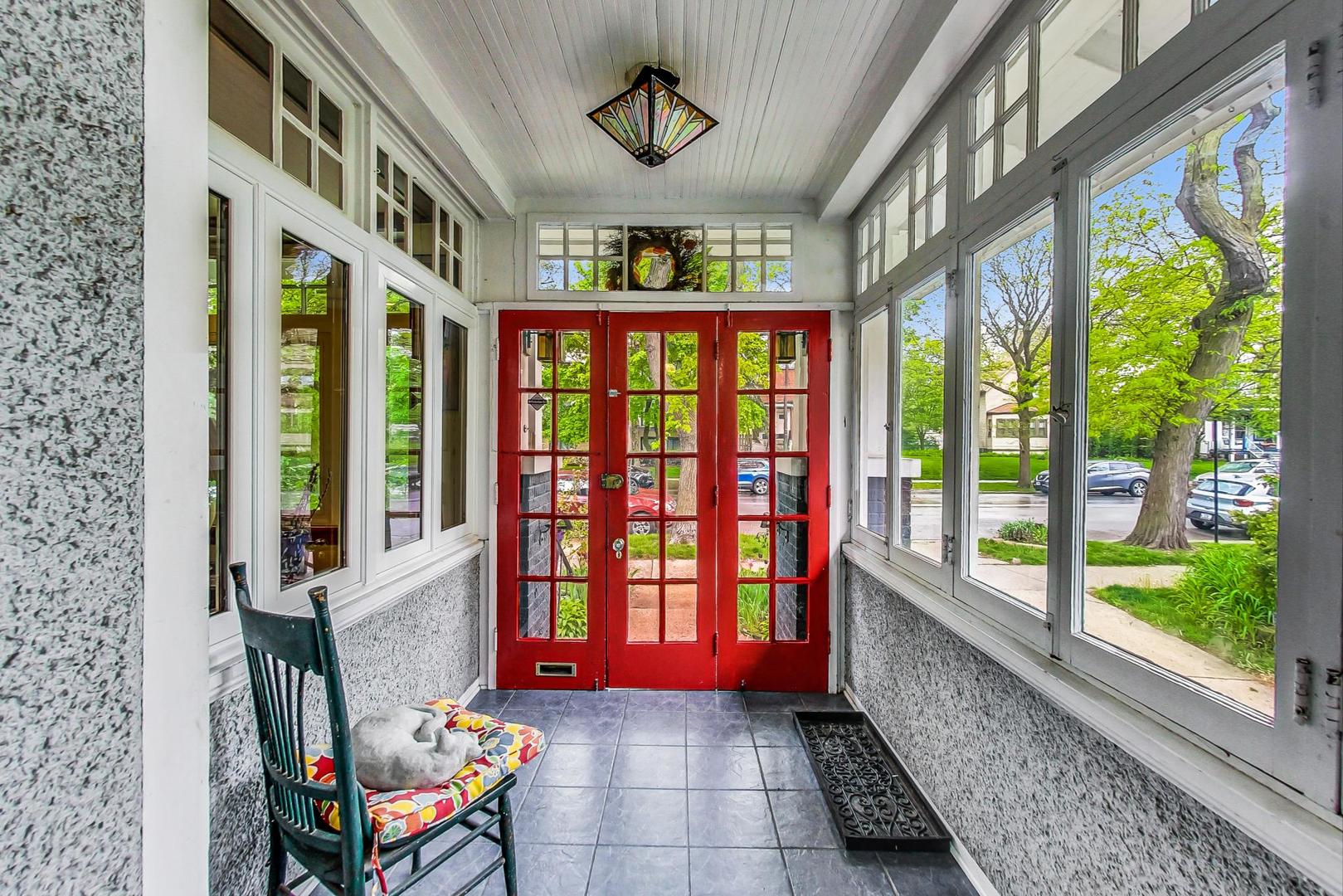 7221 North Ridge Boulevard Chicago, IL 60645 - Photo 5 of 48 a very nice looking building with big glass windows