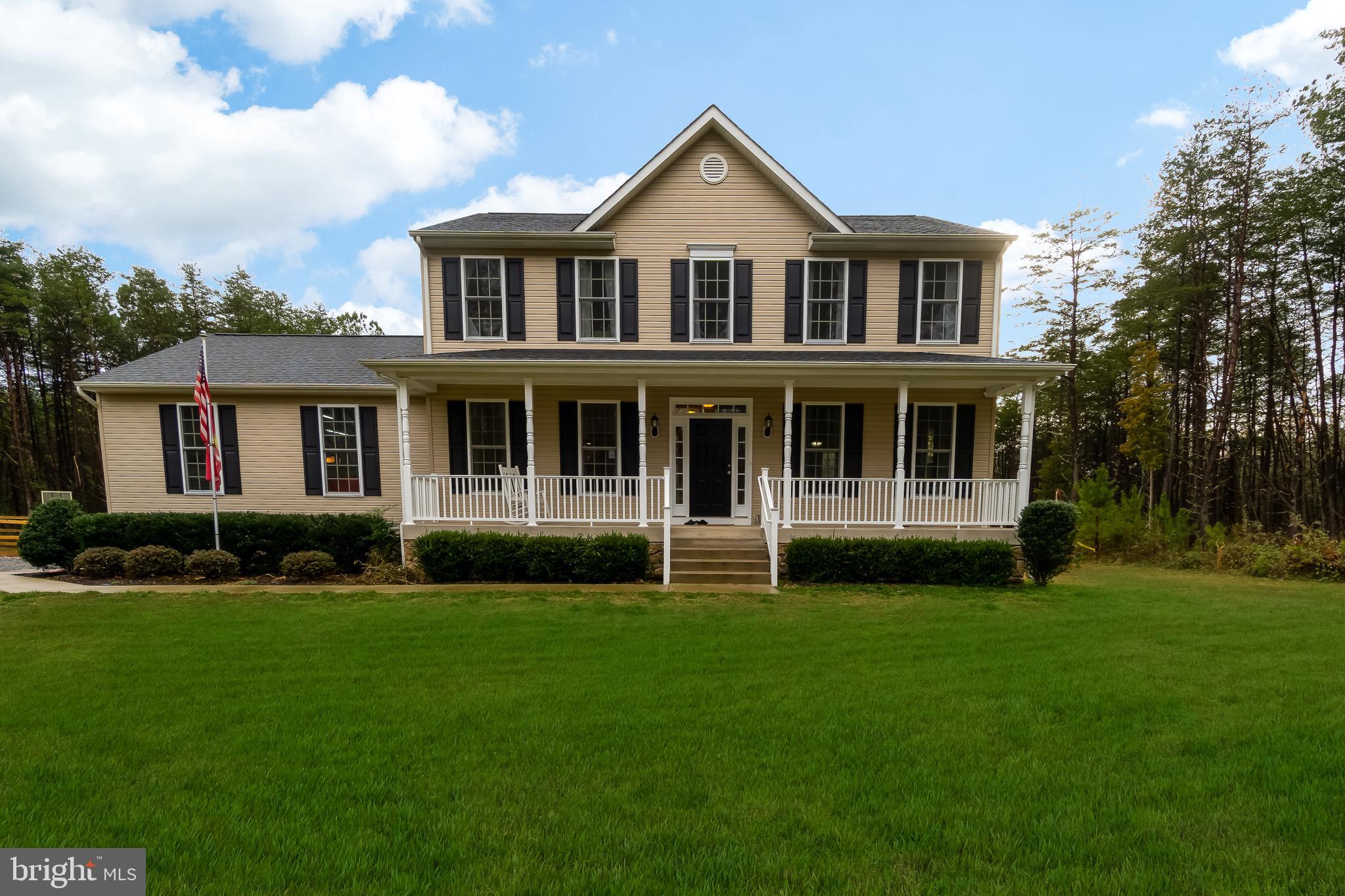 Full front porch to relax with your morning coffee