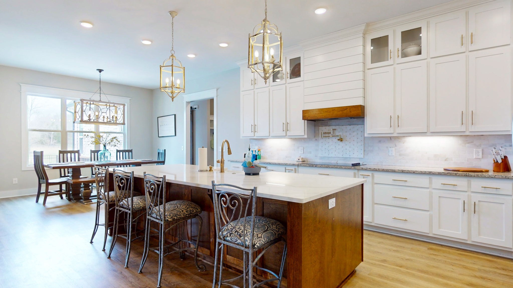 5130 Midland Road Christiana, TN 37037 - Photo 2 of 51 a kitchen with a dining table chairs sink and cabinets