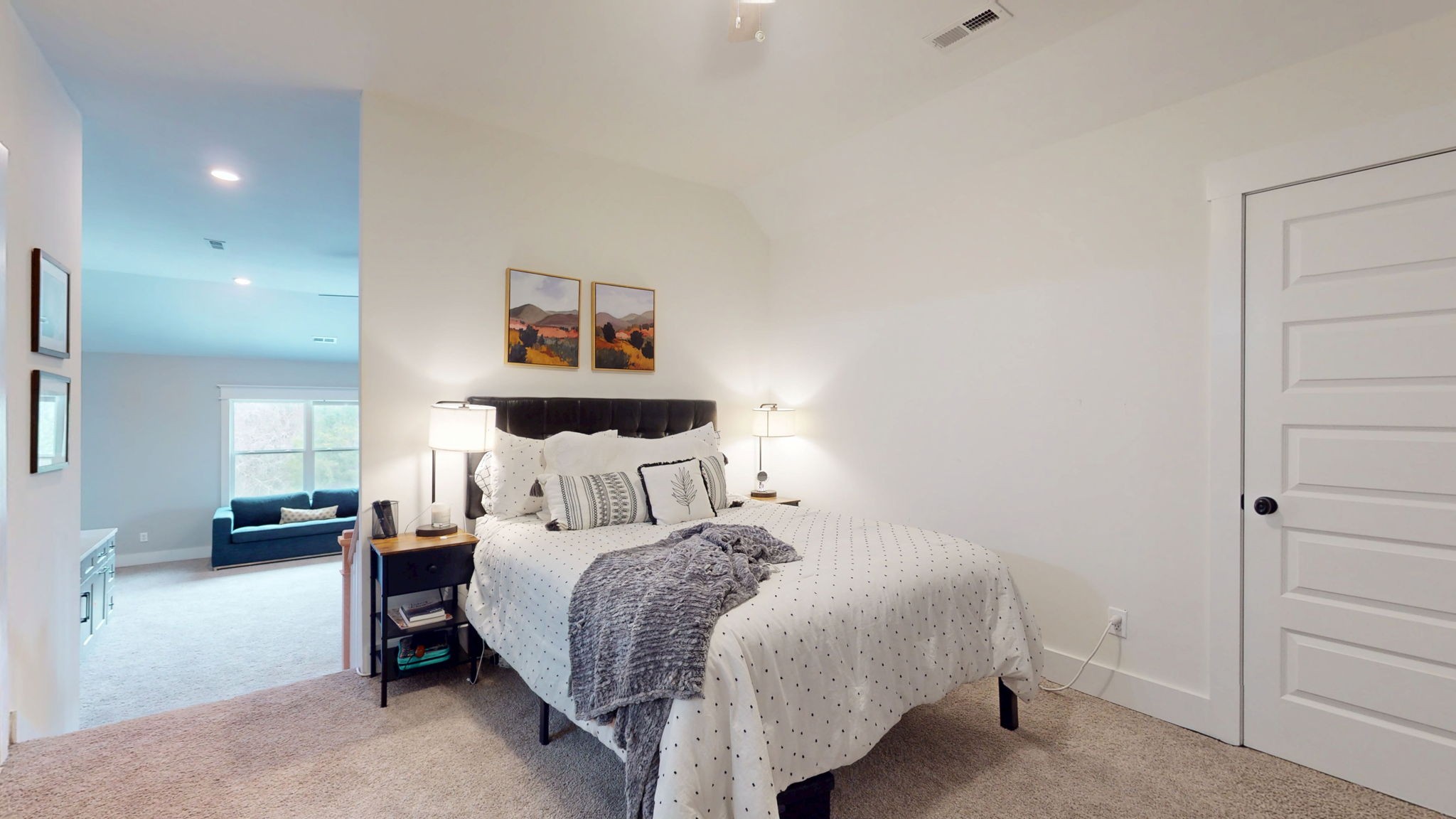 5130 Midland Road Christiana, TN 37037 - Photo 22 of 51 a bedroom with a bed and a lamp