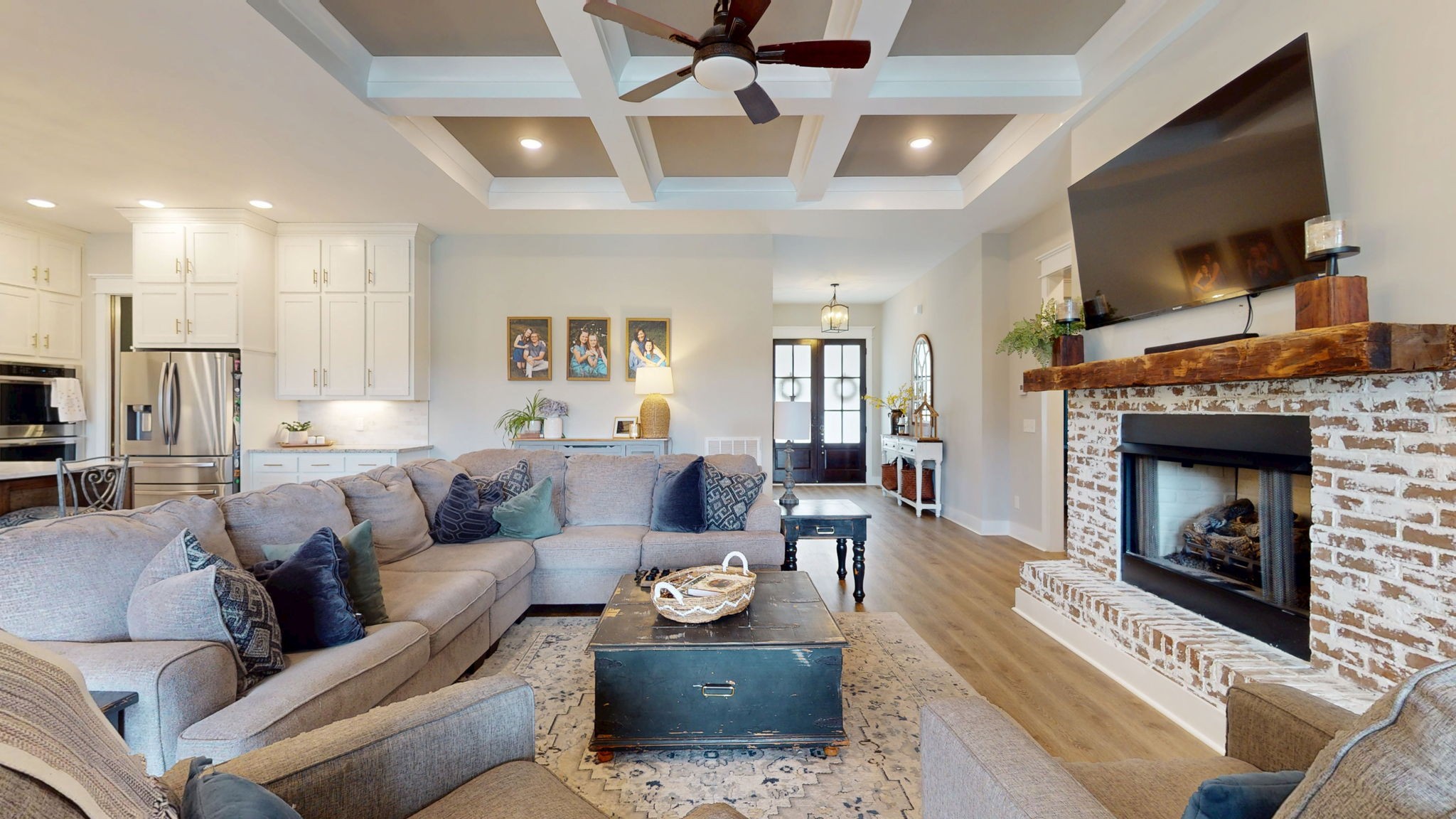 5130 Midland Road Christiana, TN 37037 - Photo 3 of 51 a living room with furniture a flat screen tv and a fireplace