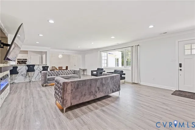 a kitchen with a sink stainless steel appliances and cabinets