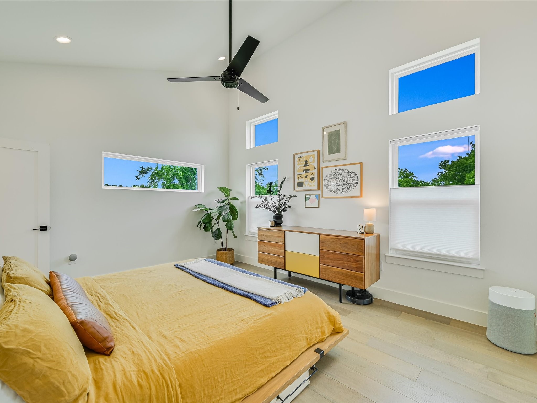 5603 Samuel Huston Avenue, Unit 1 Austin, TX 78721 - Photo 13 of 39 a bedroom with furniture and window