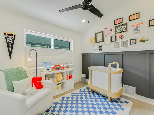 a bedroom with furniture and a couch