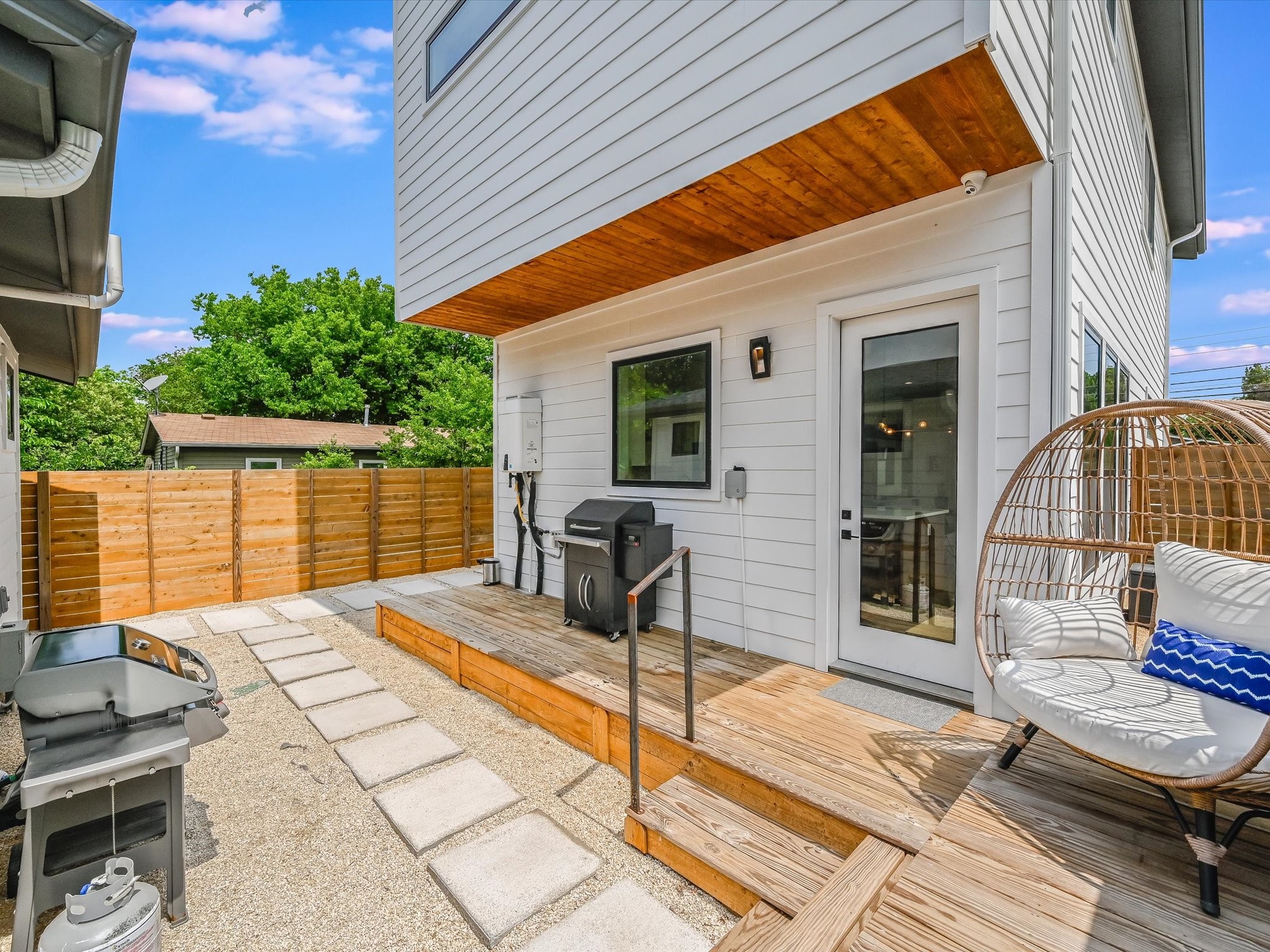 5603 Samuel Huston Avenue, Unit 1 Austin, TX 78721 - Photo 22 of 39 a backyard of a house with seating space