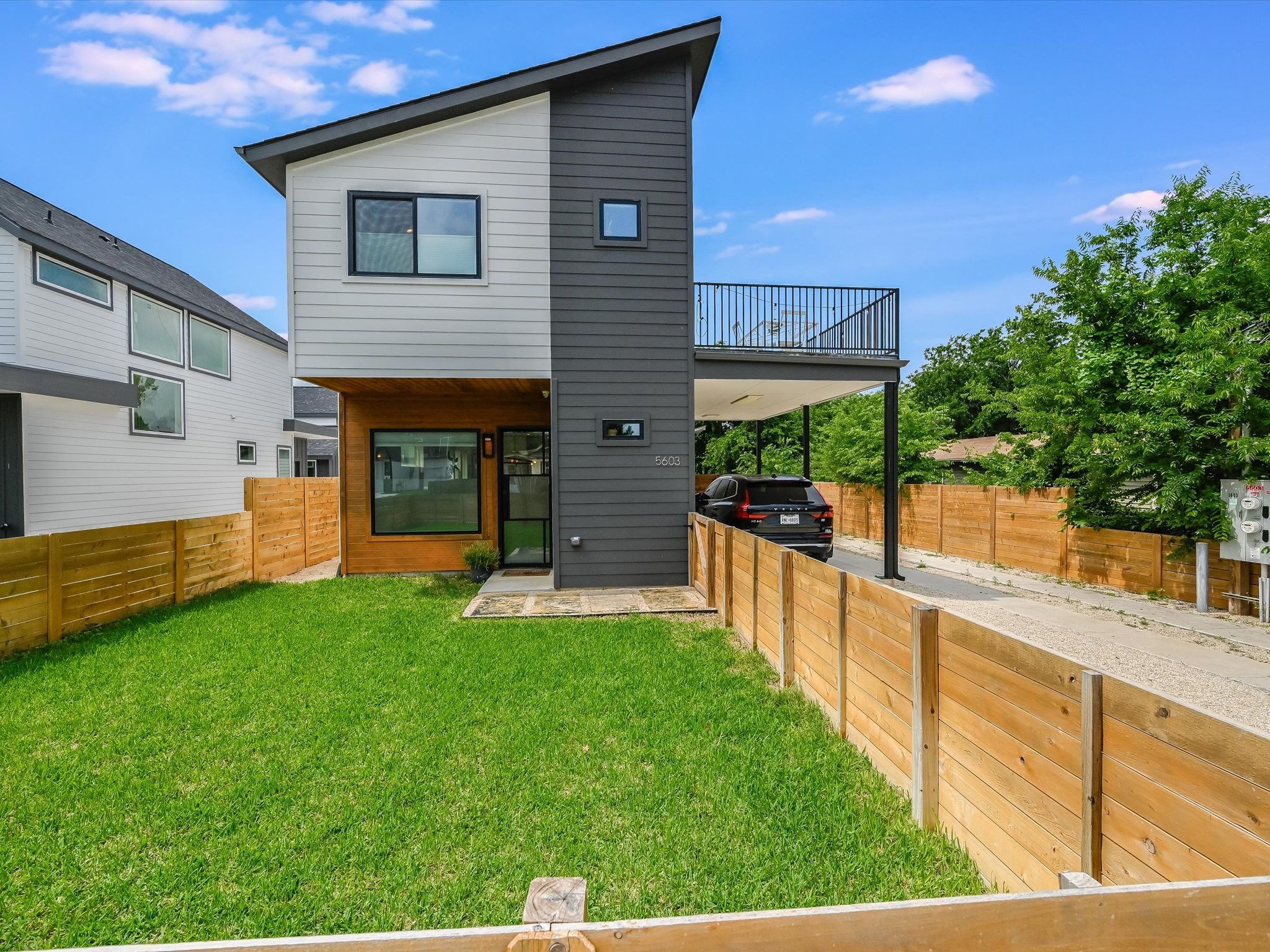 5603 Samuel Huston Avenue, Unit 1 Austin, TX 78721 - Photo 7 of 39 a view of a house with backyard and garden