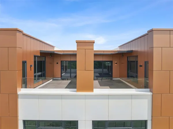 a view of white house with front door