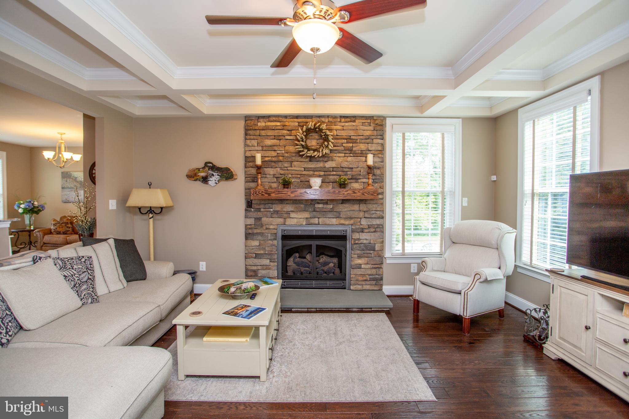 4682 Plough Tavern Road Doylestown, PA 18902 - Photo 9 of 42 a living room with furniture and a fireplace