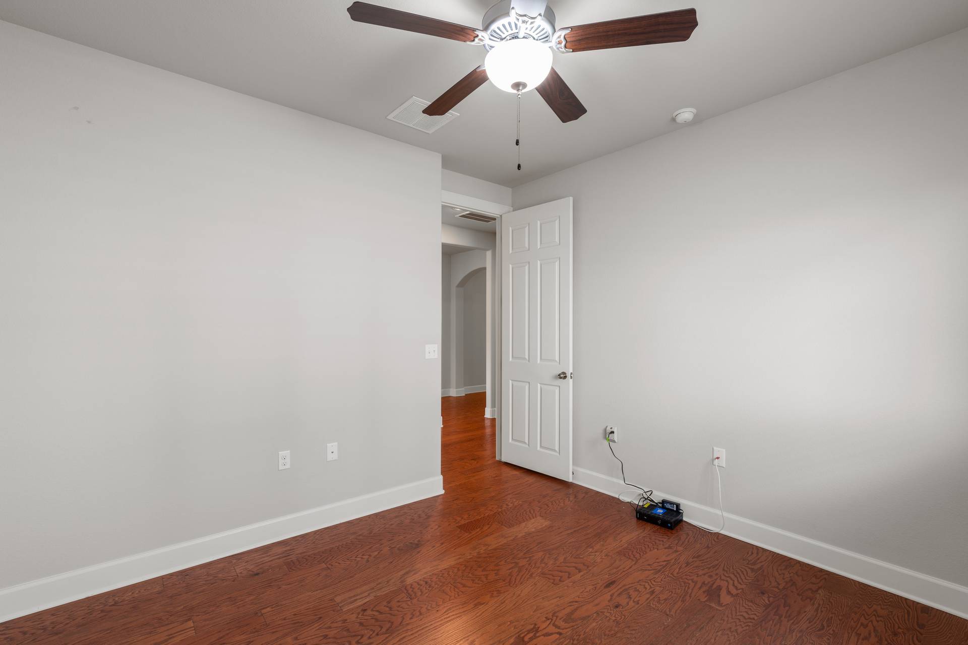 3516 Venezia View Leander, TX 78641 - Photo 21 of 40 Empty room featuring dark wood finished floors and a ceiling fan