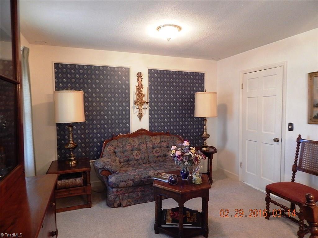 433 Hartgrove Road King, NC 27021 - Photo 11 of 26 The dining room has room for sitting area.