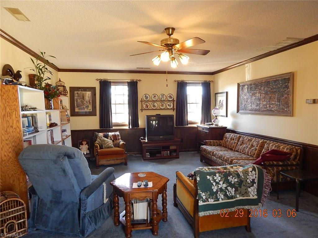 433 Hartgrove Road King, NC 27021 - Photo 7 of 26 Huge den for family gatherings.