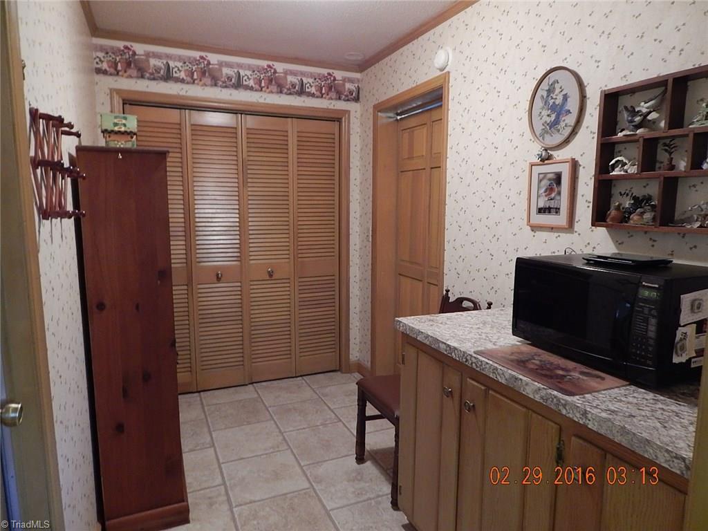 433 Hartgrove Road King, NC 27021 - Photo 9 of 26 Extra cabinet and counter space.