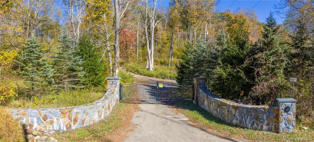 a bathroom with a bathtub and trees